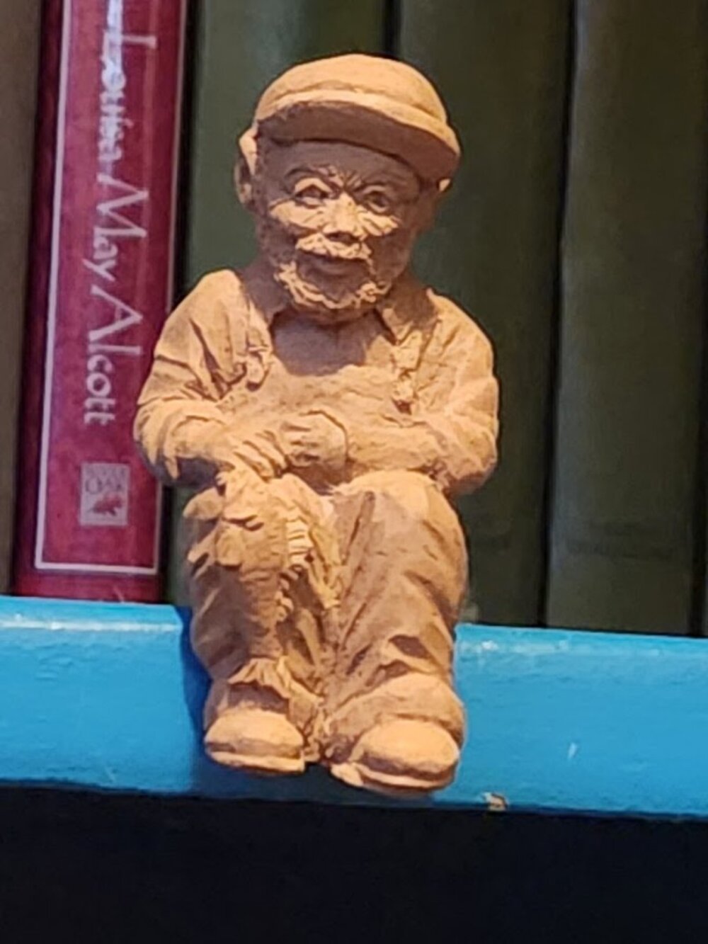 "Seated Fisherman with Catch" (or Shelf-Sitter Fisherman) from the 1991 TnT